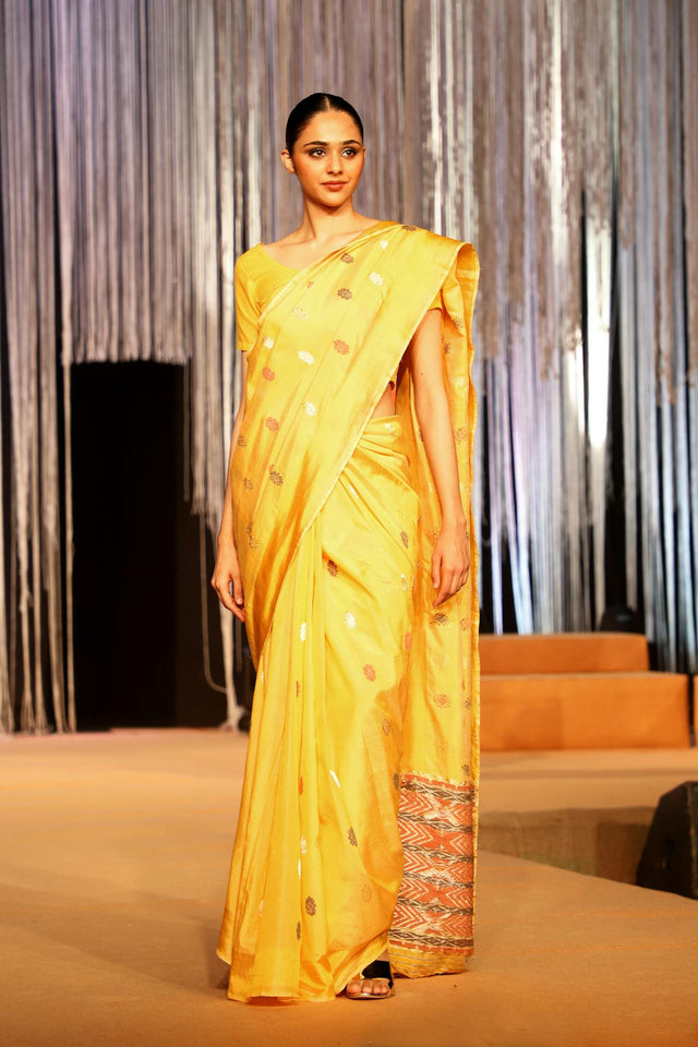 "Handcrafted pure dress and golden saree featuring Lambani designs from Soojidaarada Mane."