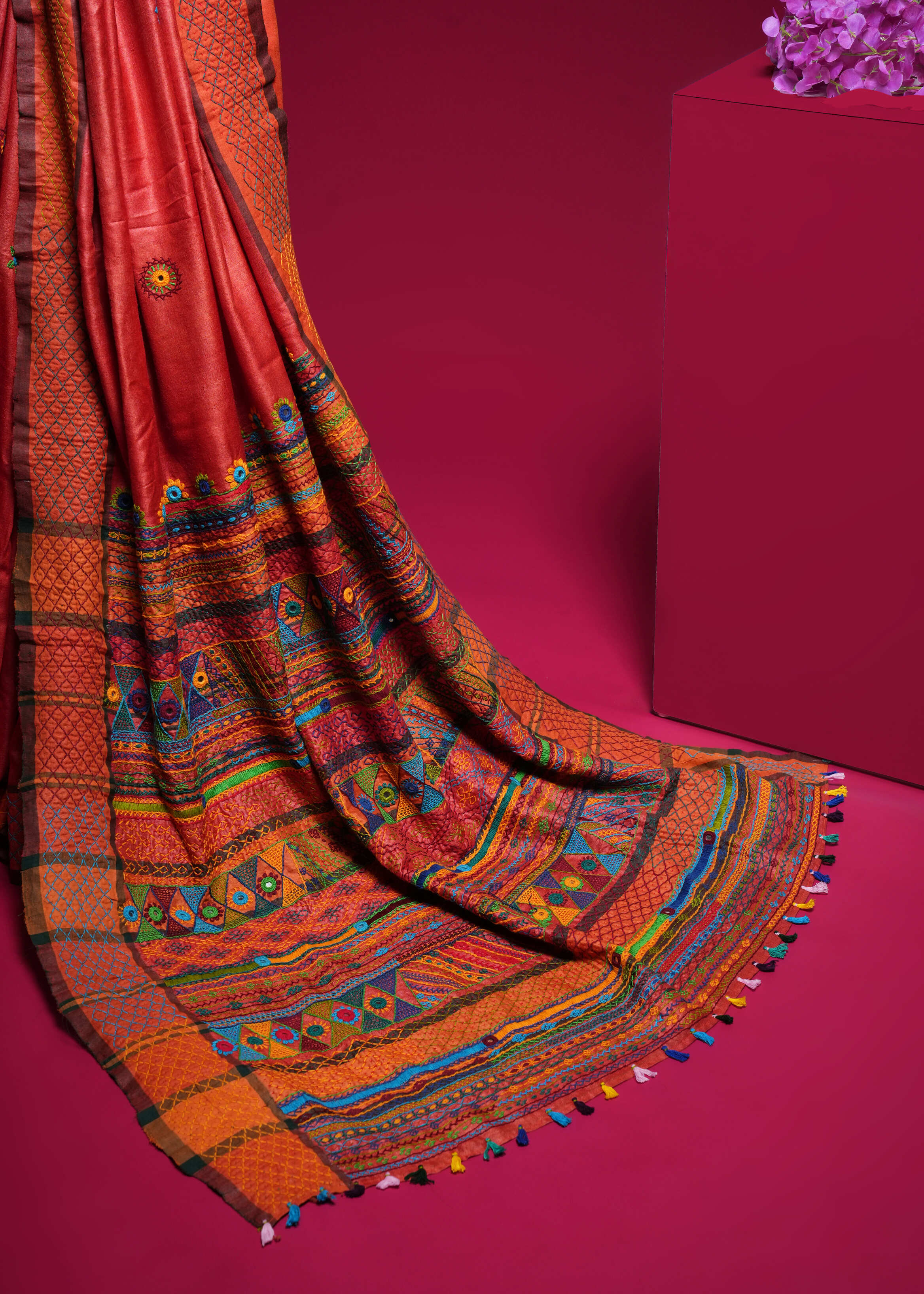 Rust Orange Tusser Silk Lambani Saree with Multicolor Embroidered Pallu