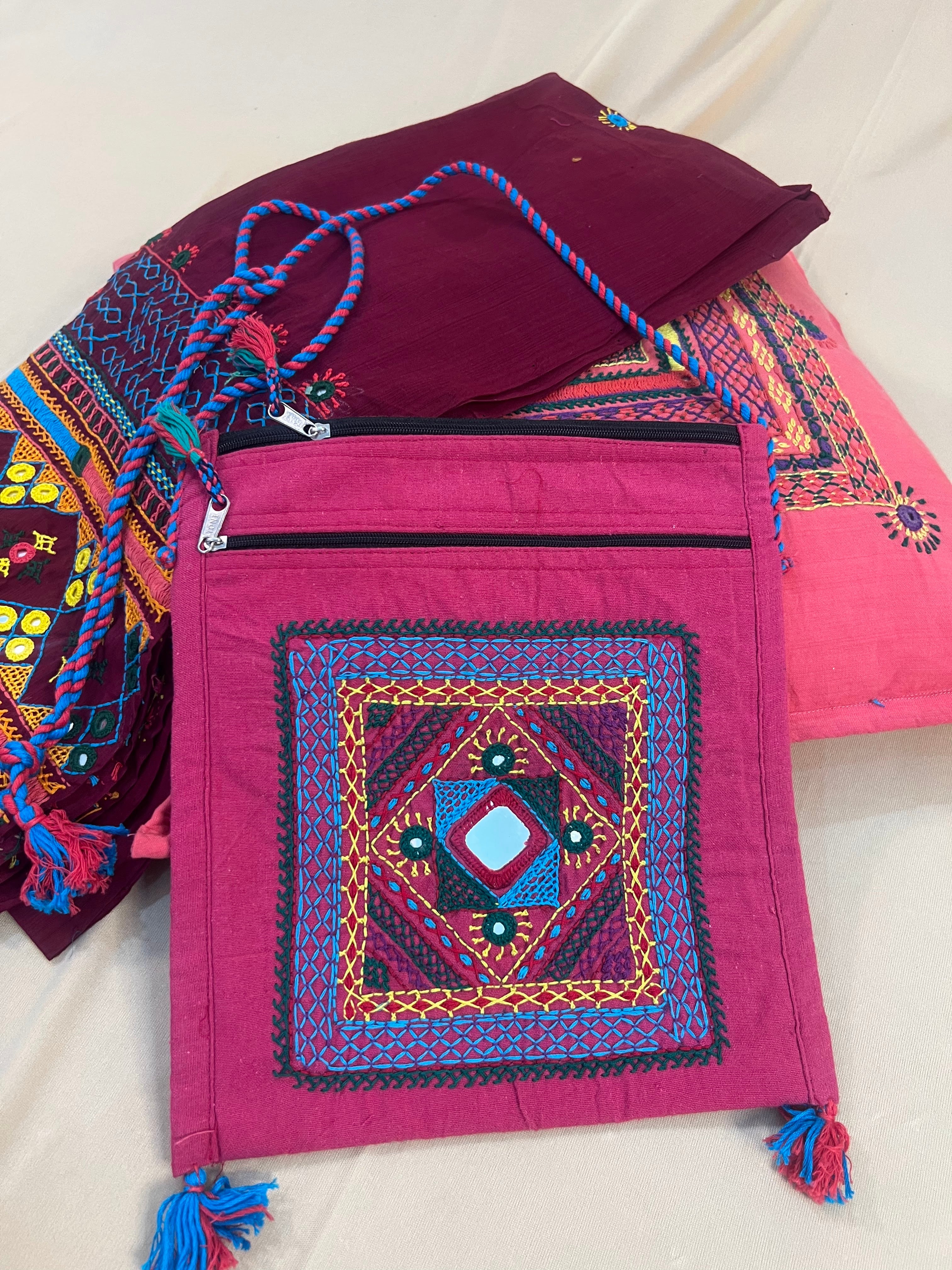 Magenta Handloom Cotton Sling Bag with Tribal Mirror Embroidery & Braided Strap