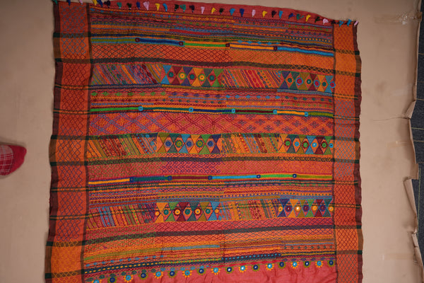 Rust Orange Tusser Silk Lambani Saree with Multicolor Embroidered Pallu