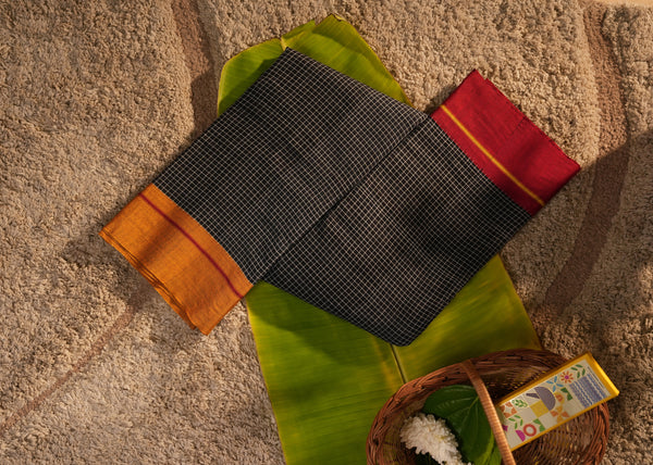 Patteda Anchu Cotton Black Saree – Checkered with Red & Orange Border